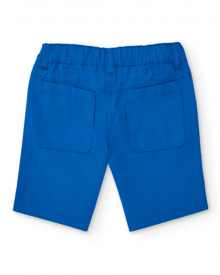 Bermuda para niño en azul eléctrico con estampado de palmera
