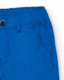 Bermuda para niño en azul eléctrico con estampado de palmera
