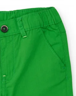 Bermuda para niño en verde con estampado de palmera