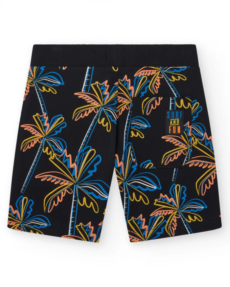 Bermuda pour garçon en noir avec imprimé tropical et taille élastique.