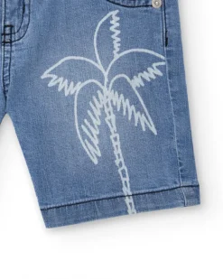 Bermuda vaquera para niño en azul con estampado de palmera