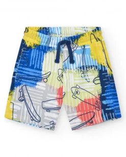 Bermudas pour garçon en bleu avec taille élastique et imprimé multicolore.