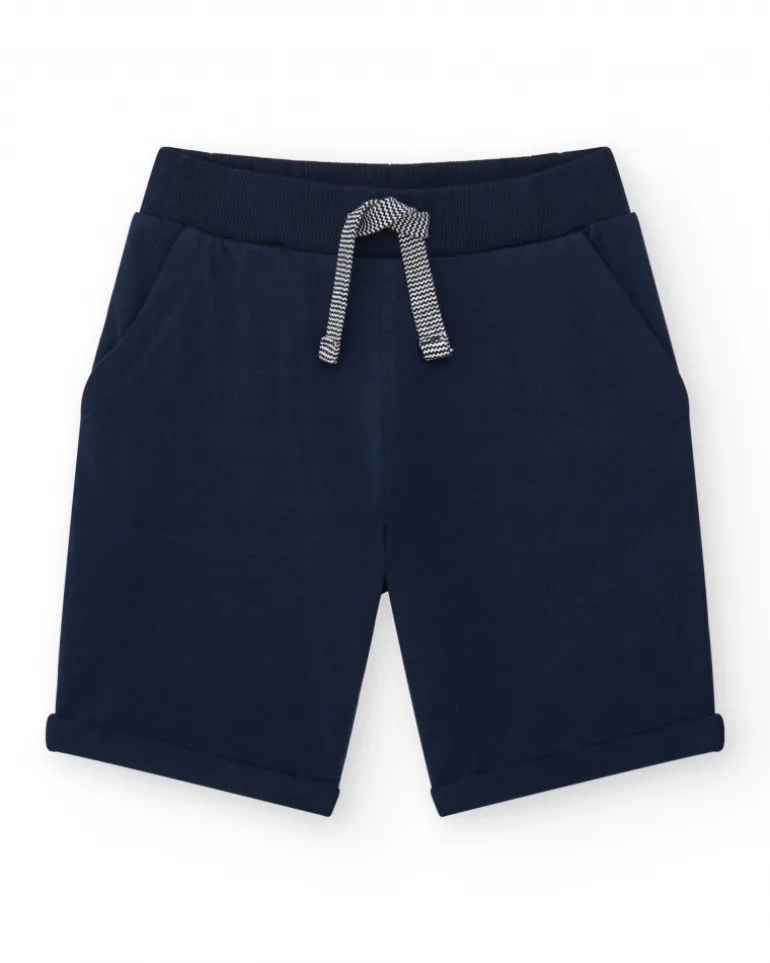 Bermudas pour garçon en bleu avec taille ajustable et poches.