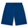 Bermudas pour garçon en bleu marine avec taille ajustable et poches.