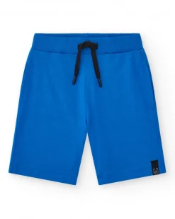 Bermudas pour garçon en bleu avec taille ajustable et poches.