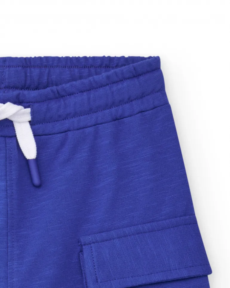 Bermudas pour garçon en bleu avec poches et taille élastique.