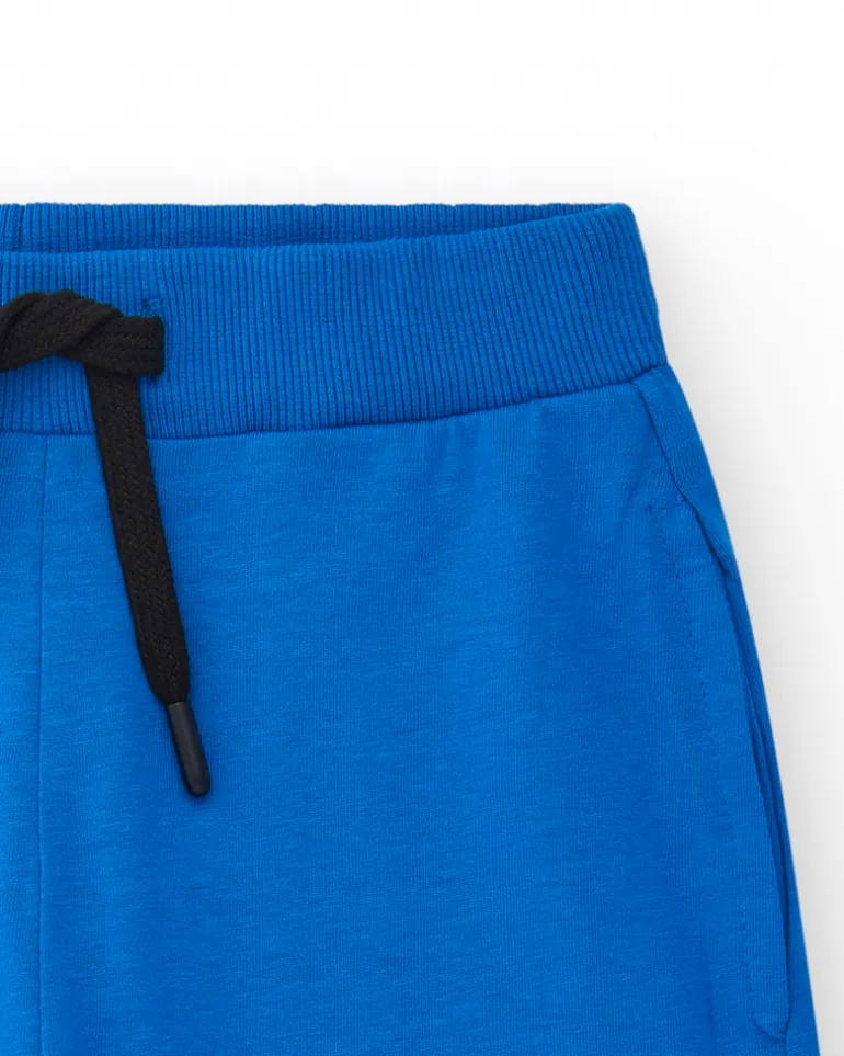 Bermudas pour garçon en bleu avec taille ajustable et poches.
