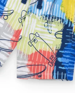 Bermudas pour garçon en bleu avec taille élastique et imprimé multicolore.