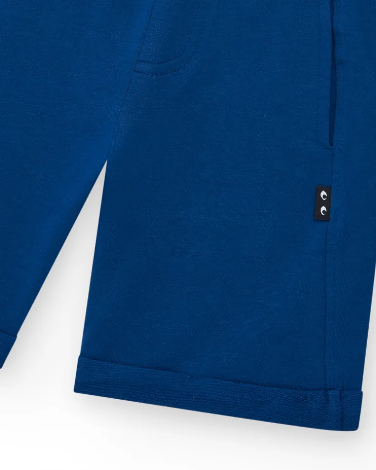 Bermudas pour garçon en bleu marine avec taille ajustable et poches.