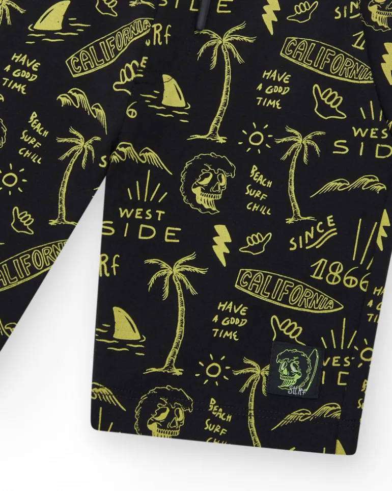 Bermudas pour garçon en noir avec taille élastique et imprimé.