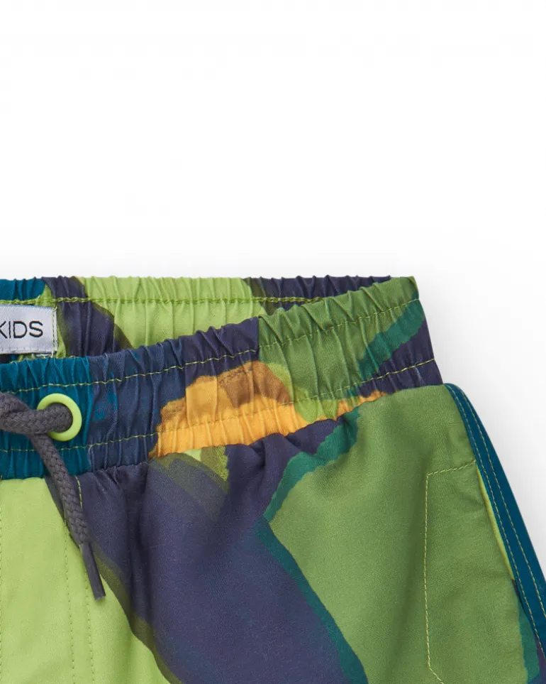 Bermudas pour garçon en vert avec imprimé tropical.