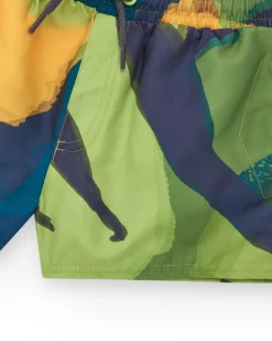 Bermudas pour garçon en vert avec imprimé tropical.