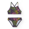 Bikini pour fille en bleu marine avec bretelles et imprimé tropical.