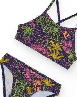 Bikini pour fille en bleu marine avec bretelles et imprimé tropical.