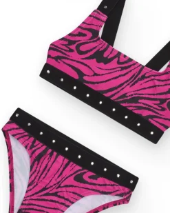 Bikini pour fille en rose avec imprimé animal et clous métalliques.