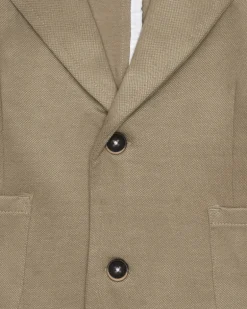 Blazer beige pour garçon avec fermeture à deux boutons et poches