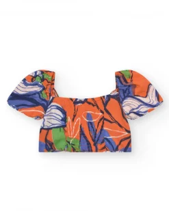 Blouse pour fille en orange avec imprimé floral.