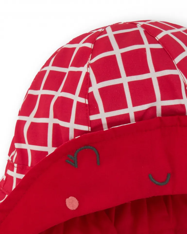 Bonnet en tricot rouge pour fille avec carreaux blancs et visage brodé