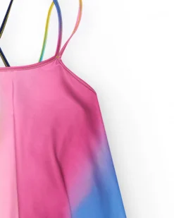 Chemise multicolore pour fille avec bretelles croisées dans le dos.