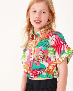 Chemise pour fille avec imprimé tropical et nœud à l’avant.