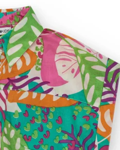Chemise pour fille avec imprimé tropical et nœud à l’avant.