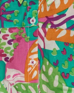 Chemise pour fille avec imprimé tropical et nœud à l’avant.