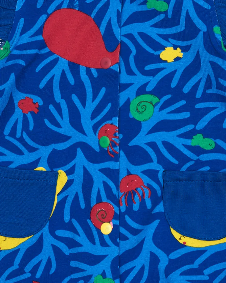 Combinaison bleue pour fille avec imprimé marin et poches en forme de poisson