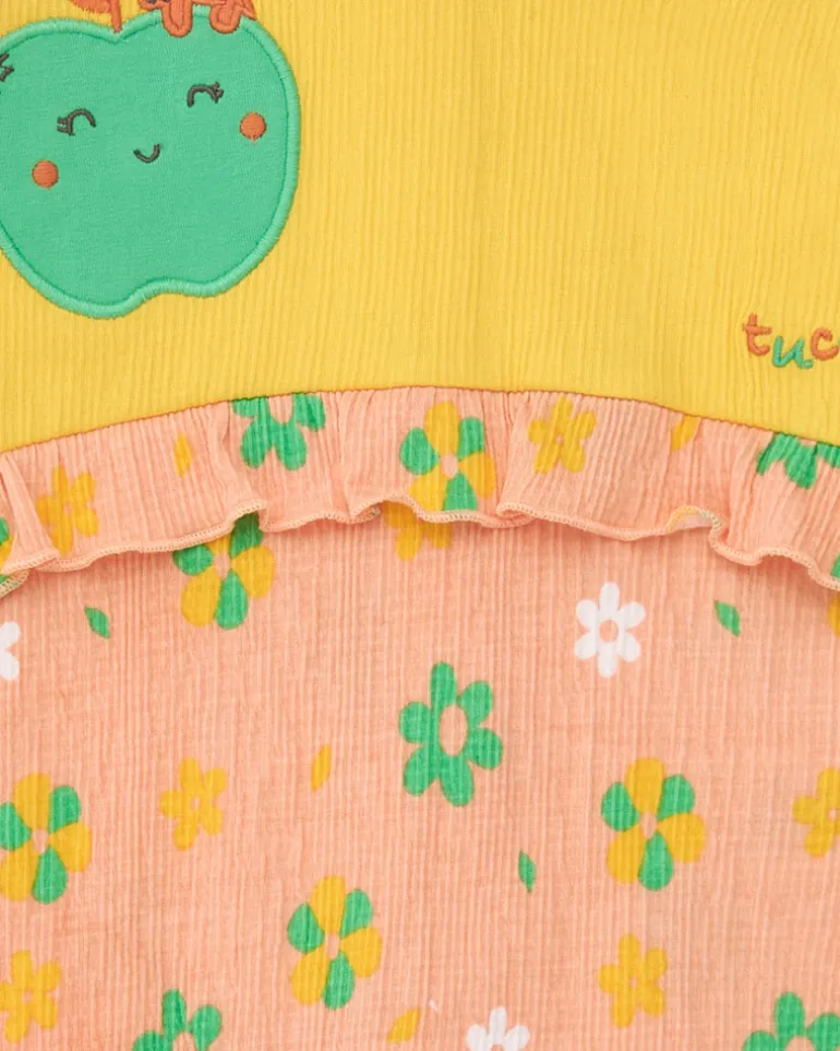 Combinaison jaune pour fille avec pomme brodée et partie rose à imprimé floral