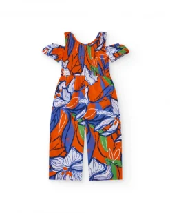 Combinaison longue pour fille en orange avec épaules dénudées.