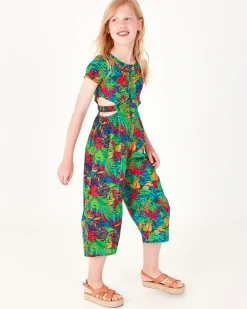 Combinaison pour fille avec imprimé tropical, boutons sur le devant et ouvertures latérales.
