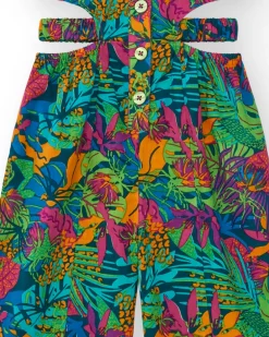 Combinaison pour fille avec imprimé tropical, boutons sur le devant et ouvertures latérales.