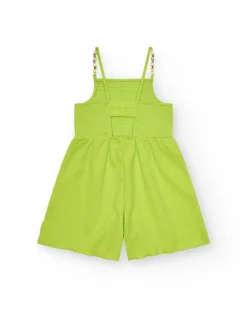 Combinaison pour fille en vert avec bretelles et détails multicolores.