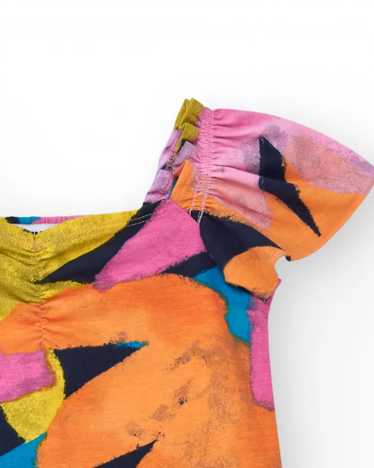 Combinaison pour fille multicolore avec manches bouffantes et encolure froncée.