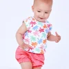 Ensemble blanc et corail pour fille avec t-shirt de feuilles tropicales et shorts froncés