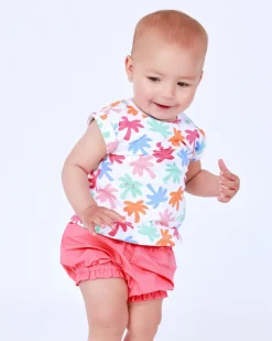 Ensemble blanc et corail pour fille avec t-shirt de feuilles tropicales et shorts froncés