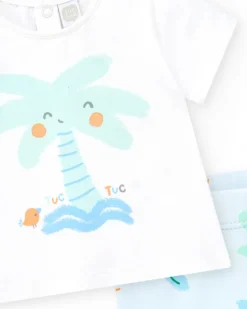 Ensemble de bain pour garçon avec t-shirt blanc de palmier et pantalon bleu à imprimé tropical