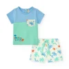 Ensemble pour garçon avec t-shirt bleu et vert et shorts blancs imprimés de palmiers et soleils