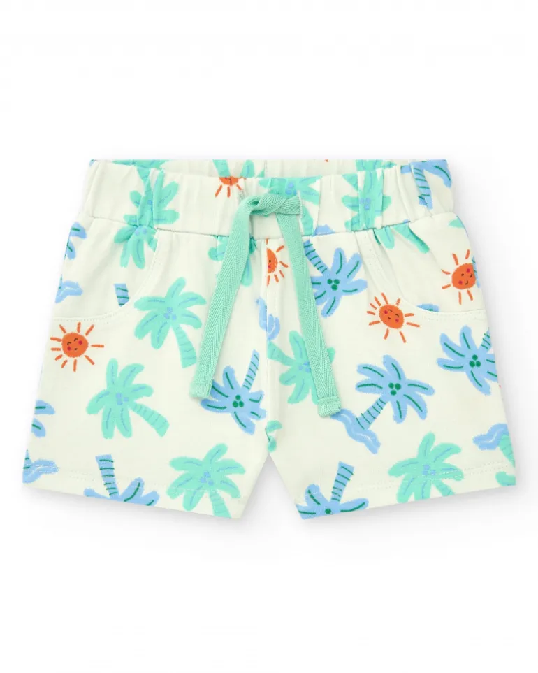 Ensemble pour garçon avec t-shirt bleu et vert et shorts blancs imprimés de palmiers et soleils