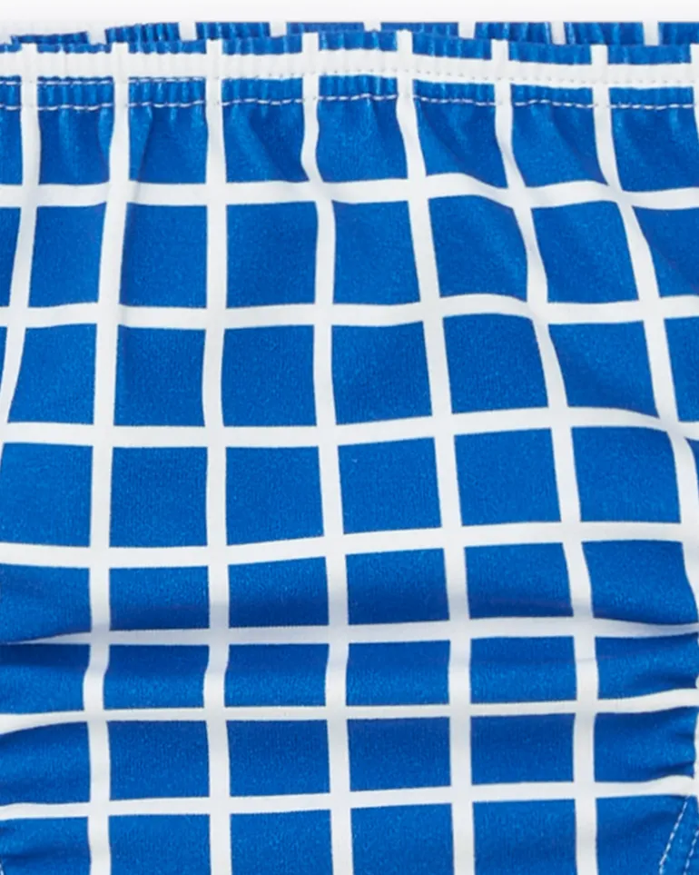Ensemble pour garçon avec bonnet bleu brodé et culotte à carreaux blancs