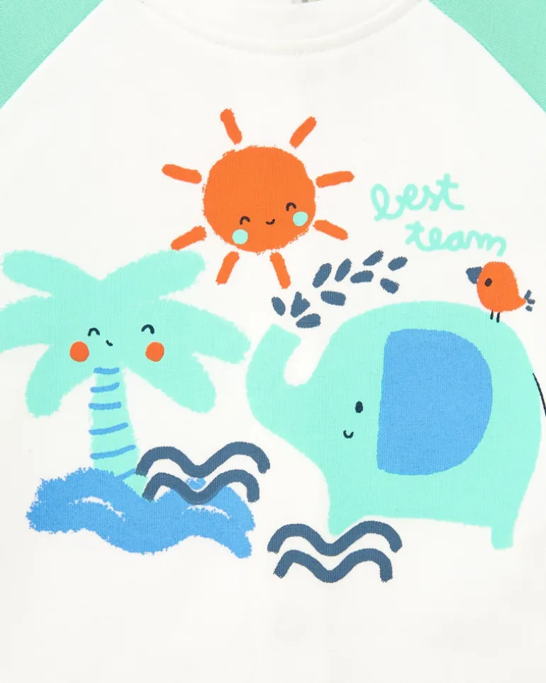 Ensemble pour garçon avec t-shirt blanc à imprimé tropical et shorts verts avec détails bleus