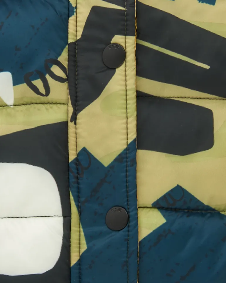 Gilet matelassé vert pour garçon avec imprimé de dinosaures