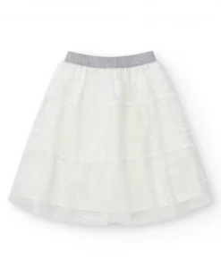 Jupe pour fille en blanc avec sequins et taille élastique.