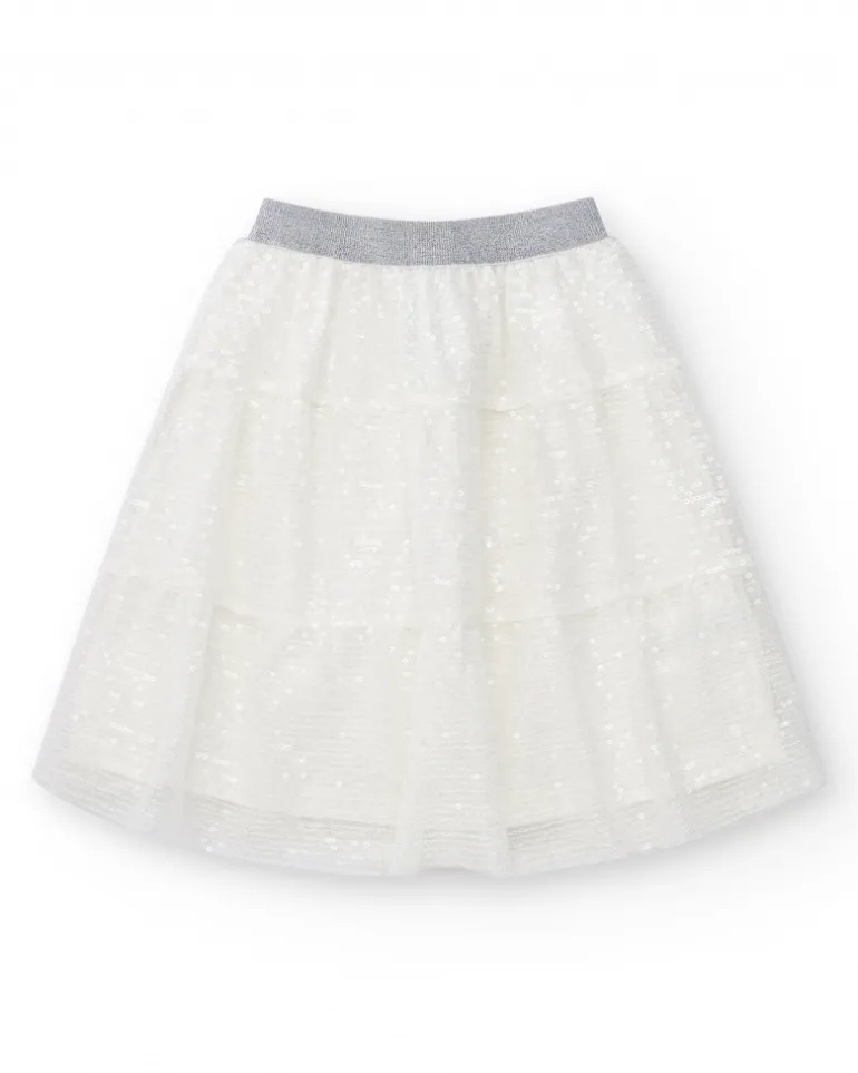 Jupe pour fille en blanc avec sequins et taille élastique.