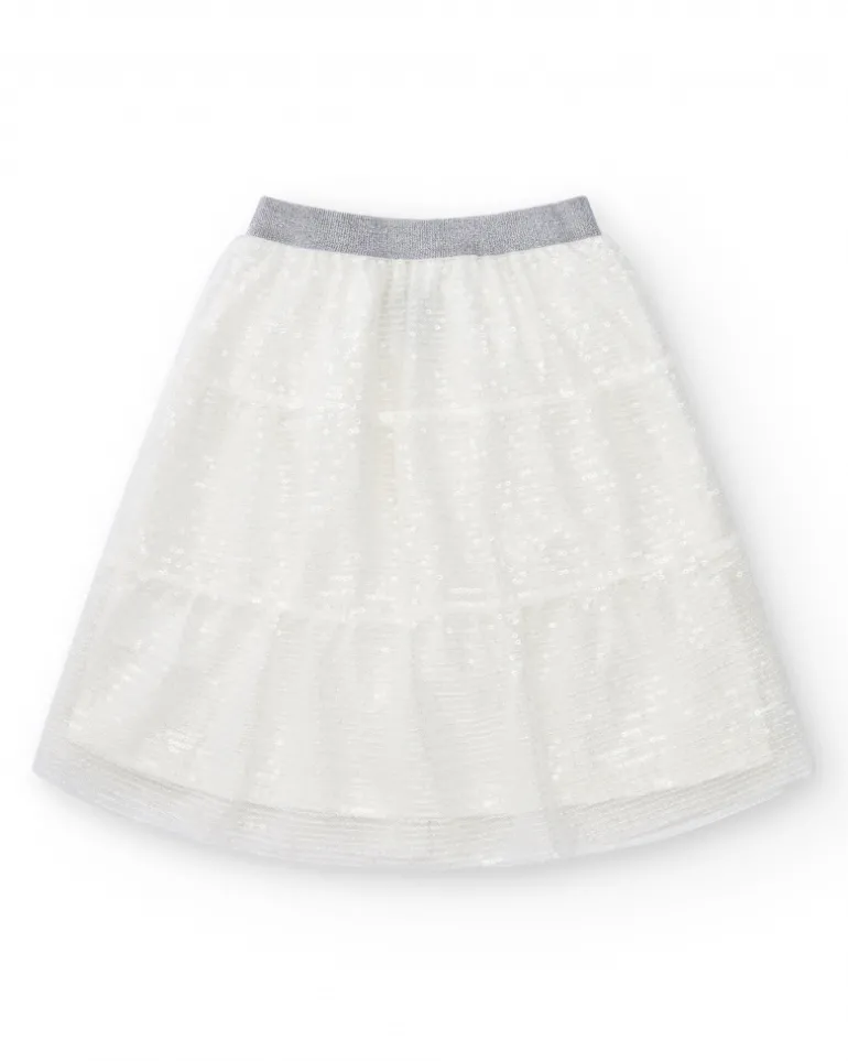 Jupe pour fille en blanc avec sequins et taille élastique.