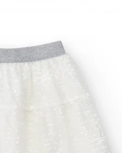 Jupe pour fille en blanc avec sequins et taille élastique.