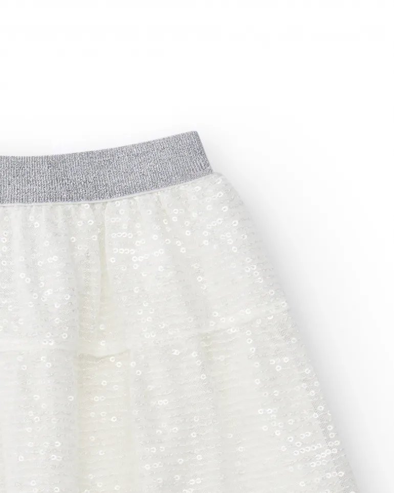 Jupe pour fille en blanc avec sequins et taille élastique.