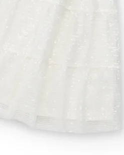 Jupe pour fille en blanc avec sequins et taille élastique.