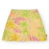 Jupe pour fille en jaune avec imprimé tropical et taille élastique.