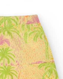 Jupe pour fille en jaune avec imprimé tropical et taille élastique.