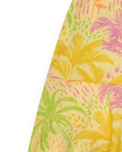 Jupe pour fille en jaune avec imprimé tropical et taille élastique.